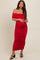 woman wearing a red off-shoulder maternity dress with ruched detailing and a visible baby bump