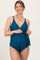 woman wearing a teal maternity one-piece swimsuit with adjustable straps and a front tie detail