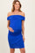 woman wearing a blue off-the-shoulder maternity dress with ruching and a visible baby bump