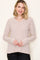woman wearing a cream and burgundy striped long sleeve v-neck top with relaxed fit and soft fabric