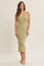 woman wearing a sage green fitted midi dress with a scoop neckline and spaghetti straps