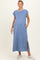 woman wearing a light blue maternity maxi dress with short sleeves and side slits, showing her baby bump