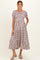 woman wearing a striped maternity dress with short sleeves and tiered design, featuring a baby bump