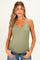 woman wearing an olive green ribbed maternity tank top with lace trim and holding her baby bump