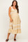 woman wearing a yellow floral maternity dress with lace trim and a baby bump