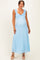 woman wearing a light blue lace maternity maxi dress with ruffled straps and a baby bump visible