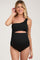 woman wearing a black one-shoulder maternity swimsuit with a cutout detail and gathered sides, highlighting her baby bump