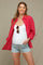 woman wearing a red checkered maternity shirt over a white tank top and denim shorts, showing her baby bump