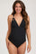 woman wearing a black maternity one-piece swimsuit with a plunging neckline and gathered detailing, showcasing her baby bump