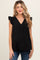 woman wearing a black maternity top with ruffled short sleeves and a v-neck, baby bump visible