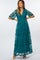 woman wearing a teal maternity maxi dress with sheer sleeves and floral embroidery