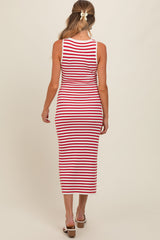 woman wearing a red and white striped maternity dress, showing a fitted style and mid-calf length from the back