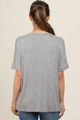 woman wearing a gray maternity t-shirt with rolled sleeves, viewed from the back