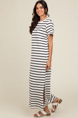 woman wearing a black and white striped maxi dress with short sleeves and side slits, paired with brown sandals