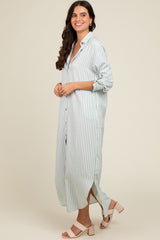 woman wearing a long striped button-up dress in light blue and white, paired with blush pink block-heeled sandals