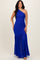 woman wearing a royal blue one-shoulder evening gown with a fitted bodice and flowy ruffled skirt