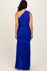woman wearing a royal blue one-shoulder maxi dress with ruched details and flowing bottom, shown from the back