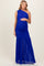 woman wearing a royal blue one-shoulder maternity gown with ruching and a sheer skirt, showcasing her baby bump