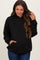 woman wearing a black maternity hoodie with a front pocket and relaxed fit, showing her baby bump