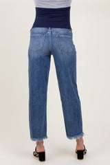 woman wearing a pair of light blue maternity jeans with a frayed hem, showing the back view