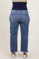 woman wearing a pair of light blue maternity plus size jeans with a frayed hem, viewed from the back