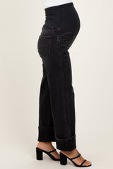 maternity wear black denim jeans with a wide leg fit, model showing baby bump and wearing strappy heels