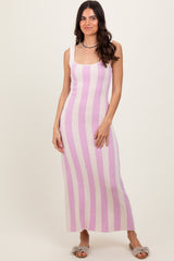 woman wearing a pink and white striped maxi dress with a square neckline and slim fit
