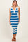 woman wearing a blue and white striped fitted midi dress with a plunging neckline and button details