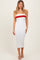 woman wearing a white ribbed midi dress with a red and beige striped bandeau top