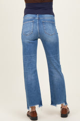 woman wearing blue maternity jeans with a distressed hem and a dark waistband, showing the back view