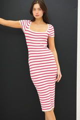 woman wearing a short sleeve red and white striped bodycon midi dress