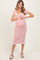 woman wearing a red and white striped maternity dress, showcasing her baby bump, styled with white sandals
