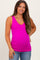 woman wearing a bright pink maternity tank top and showing her baby bump