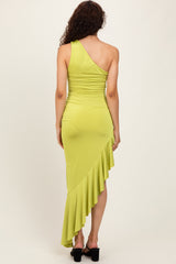 woman wearing a lime green one-shoulder midi dress with a ruffled hem and fitted silhouette