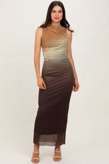 woman wearing a sleeveless ombre maxi dress in shades of brown and green, standing on a neutral background