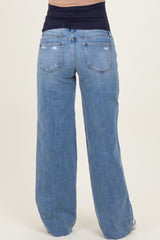 maternity wear light blue wide leg jeans with a stretchy navy waistband, view from the back