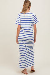 woman wearing a white and blue striped maternity maxi dress with short sleeves and a relaxed fit