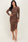 woman wearing a brown leopard print long sleeve midi dress with a side ruching detail