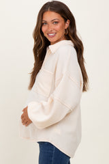 Cream Solid Ribbed Long Sleeve Pocketed Collared V-Neck Maternity Top