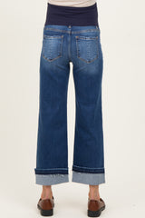 woman wearing blue maternity wide-leg jeans with a rolled hem and a supportive waistband, back view