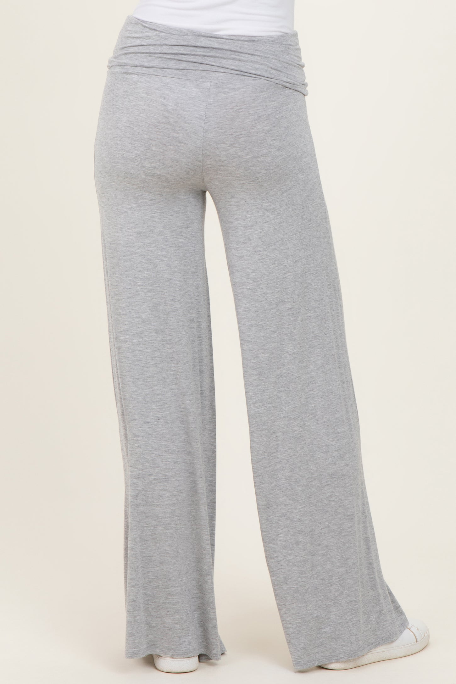 woman wearing gray wide-leg lounge pants with a ruched waistband