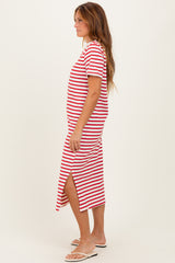 woman wearing a red and white striped midi dress with short sleeves and side slits