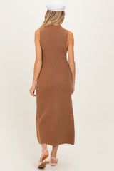 woman wearing a ribbed brown sleeveless maternity maxi dress, showing a pregnant belly from the back