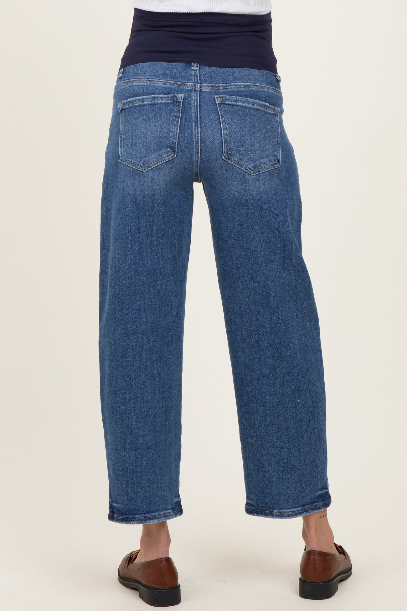 maternity wear blue high-waisted straight leg jeans with a supportive waistband, shown from the back
