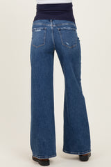 woman wearing distressed wide leg maternity jeans with a stretchy waistband from the back