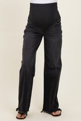 maternity black wide leg jeans with a high waistband and distressed details, model wearing sandals