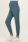 woman wearing dark teal maternity joggers with a high waistband and elastic cuffs