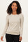 woman wearing a light beige long sleeve fitted top with a round neckline and subtle stretch