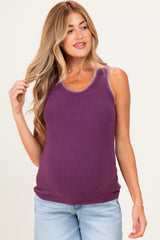woman wearing a purple maternity tank top with contrasting stitching details and a baby bump visible