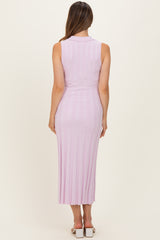 woman wearing a light pink ribbed sleeveless maternity maxi dress shown from the back